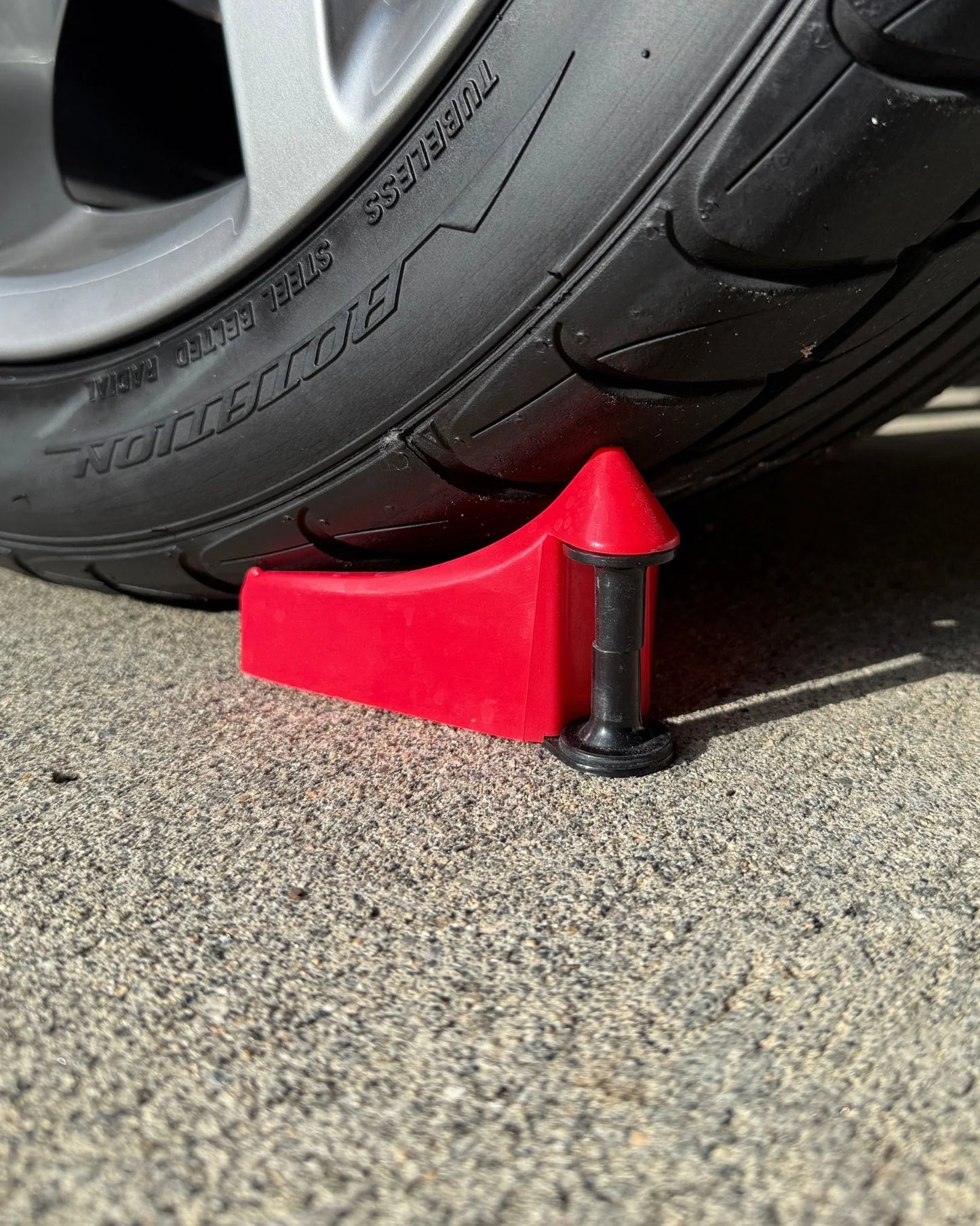 Hose Guide Wheel Wedge Under Tire