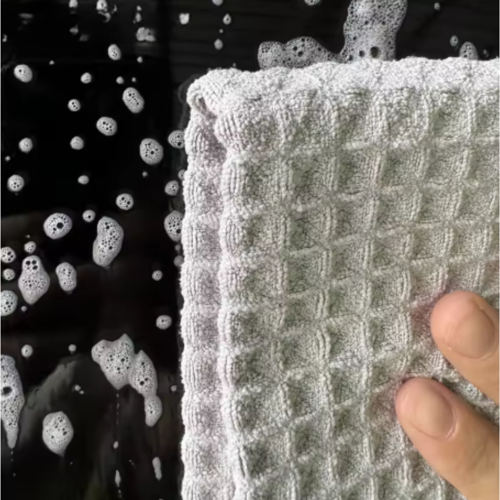 microfiber waffle weave towel on window close up